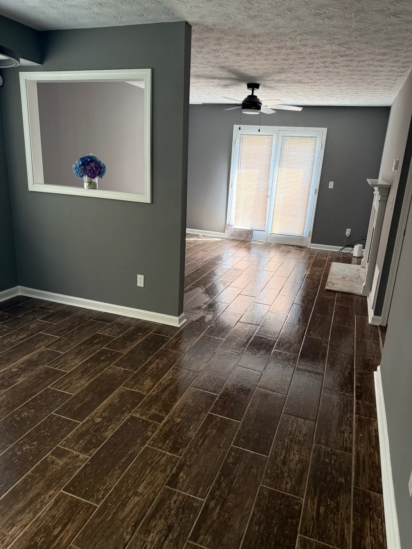 Living room with tile flooring and fireplace