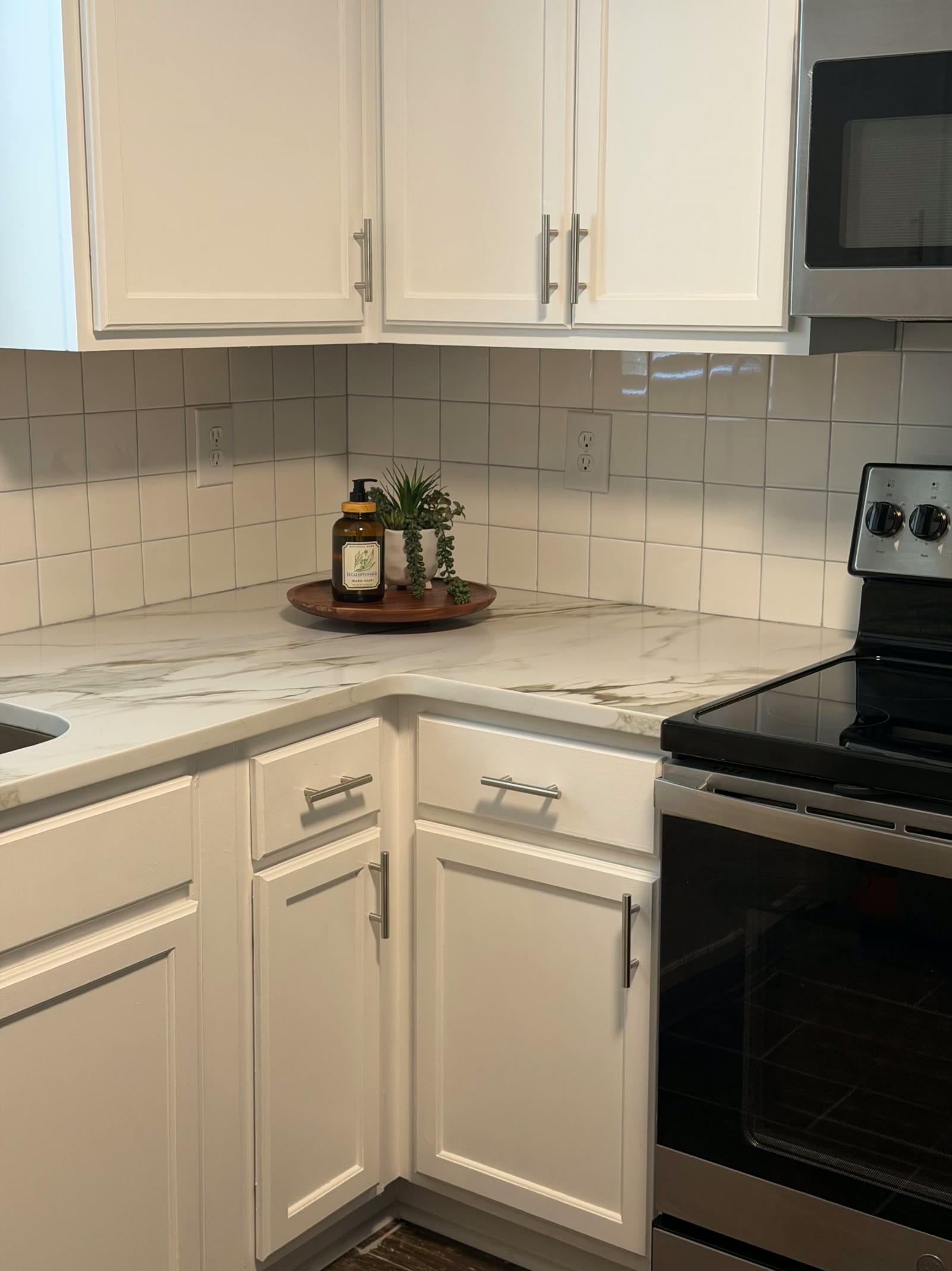 Marble-look countertops and tile backsplash
